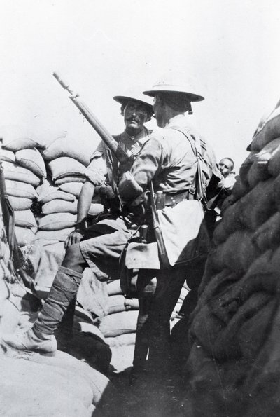 Two soldiers in a dug-out in Mesopotamia during World War One, from an album compiled by Lt. Kindom by English Photographer